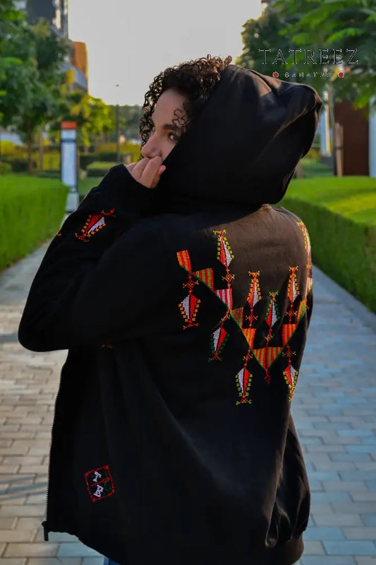 Zahraa - Flowering hoodie with zipper, featuring vibrant colors and intricate handmade floral embroidery on the front and back.
